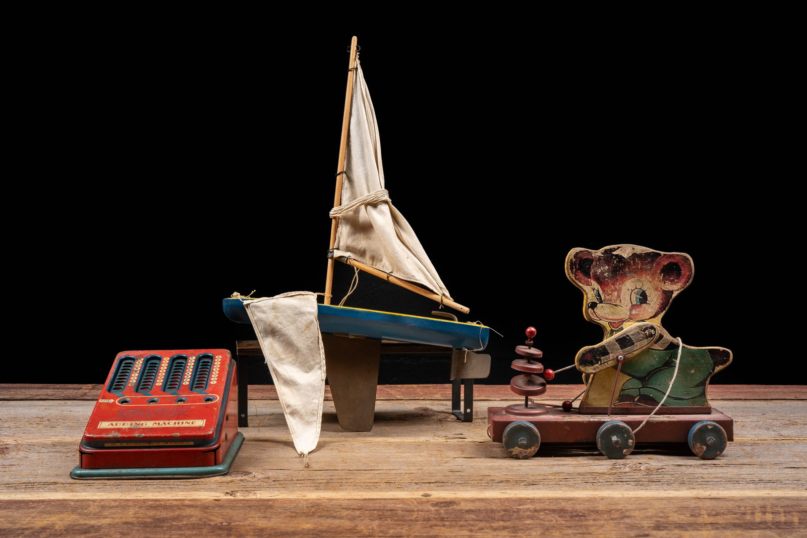 Vintage Toy Boat, Bear Pull Toy and Adding Machine: **NOTE: Any shipping quotes provided on this screen or on your Live Auctioneers invoice are provided by Live Auctioneers. In-house shipping is available on all lots. For in-house shipping quotes,