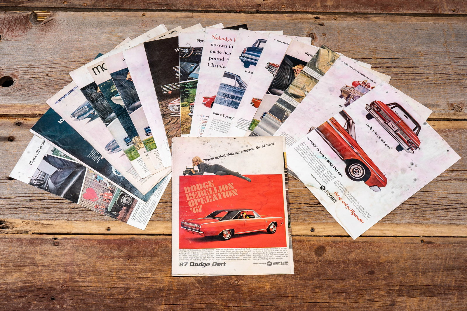 Lot of 22 Chrysler Automotive Advertising Pages: **NOTE: Any shipping quotes provided on this screen or on your Live Auctioneers invoice are provided by Live Auctioneers. In-house shipping is available on all lots. For in-house shipping quotes,