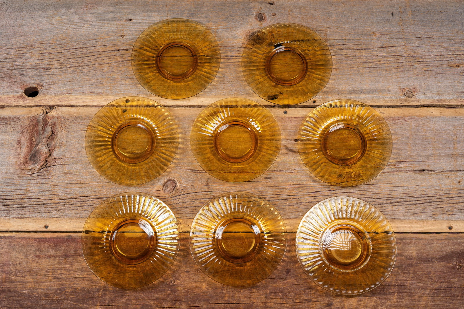 8 Amber Ribbed Glass Dessert Plates: **NOTE: Any shipping quotes provided on this screen or on your Live Auctioneers invoice are provided by Live Auctioneers. In-house shipping is available on all lots. For in-house shipping quotes,