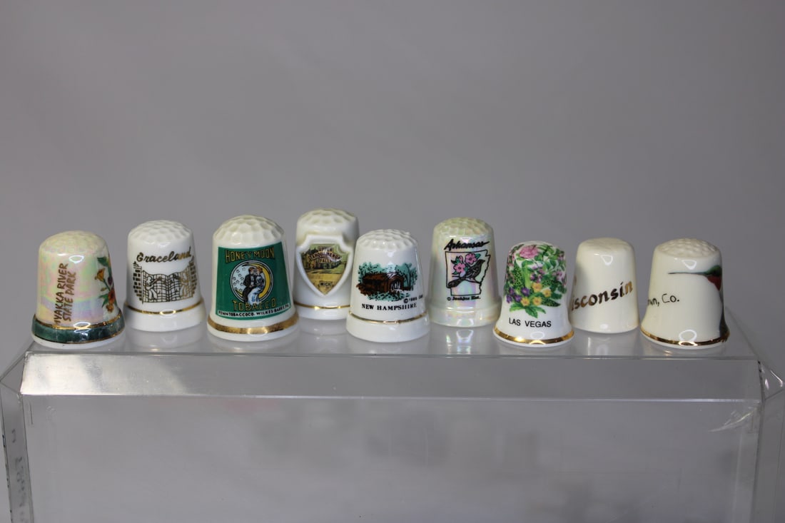 Lot of 9 Collector's Porcelain Thimbles: all from different US States - including Graceland, Las Vegas, Texas etc