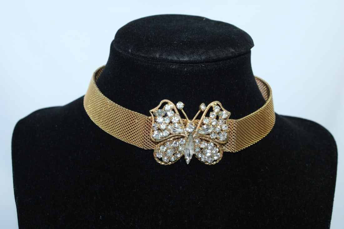 Golden Butterfly Choker: main part is 10" long - with the additional chain it is 14" long unclasped - pendant is 1 1/4" tall - as shown on photos - not tested for metal content - sold AS IS
