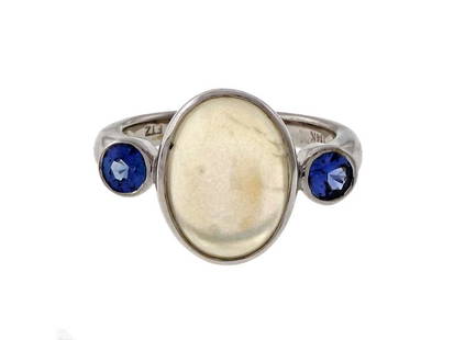 Peter Suchy 14K White Gold With 4.76ct Blue Moonstone And 0.49ct Blue Sapphire Ring Size 6.75: Peter Suchy 14K White Gold With 4.76ct Blue Moonstone And 0.49ct Blue Sapphire Ring Size 6.75 **** SKU No: 382-999-5673-01C9A **** Brand: Peter Suchy **** Condition: Pre-Owned **** Metal: White Gold *
