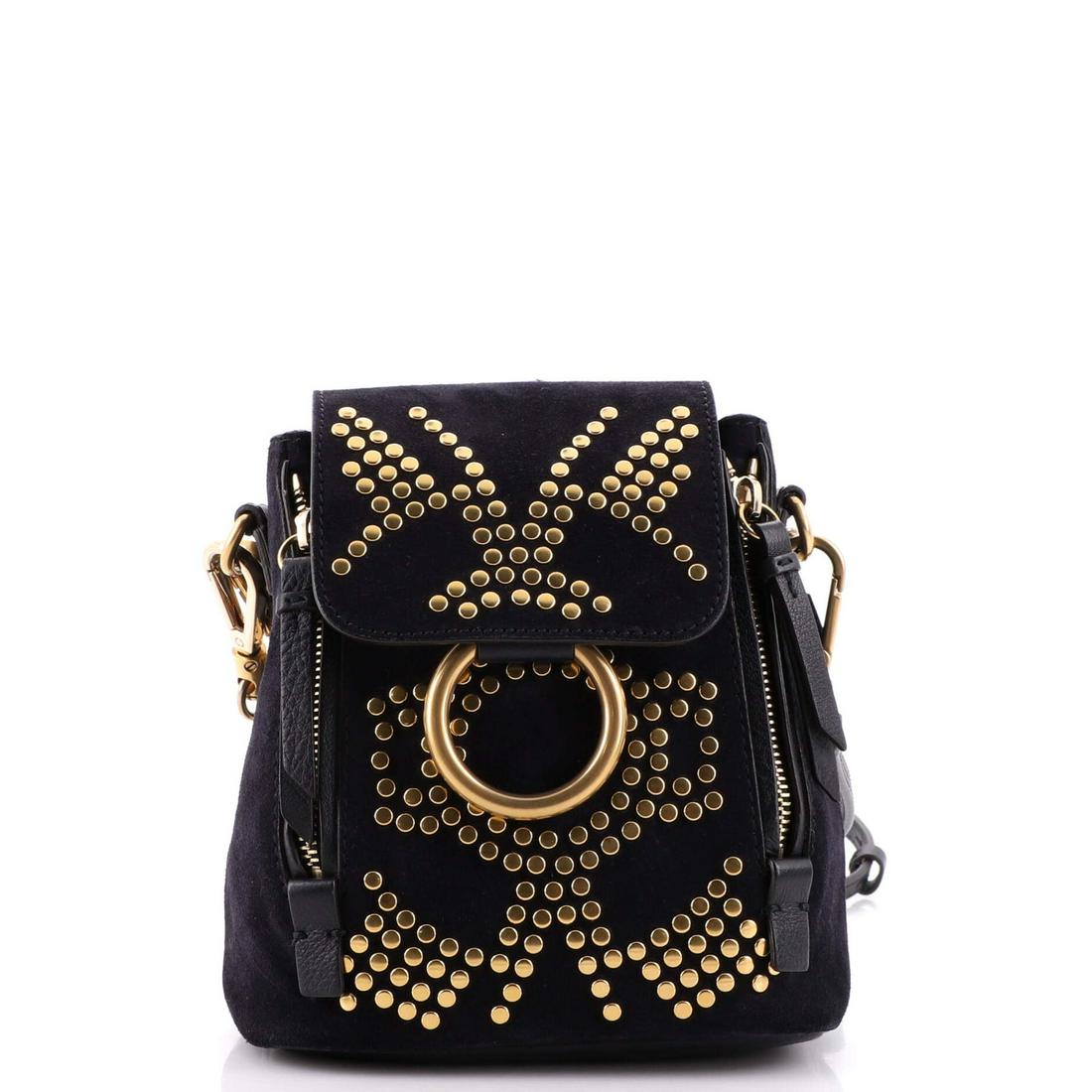 Chloe Faye Backpack Studded Leather and Suede Mini: Chloe Faye Backpack Studded Leather and Suede Mini ---- Exterior Color: Black, Blue, Multicolor ---- Interior Color: Neutral ---- Exterior Material: Leather, Suede ---- Interior Material: Fabric ----