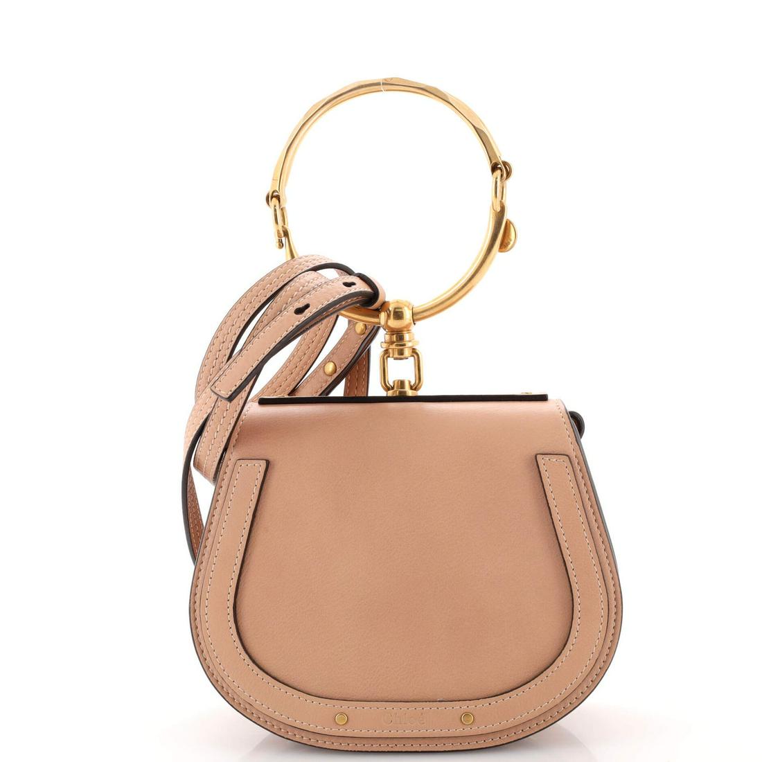 Chloe Nile Crossbody Bag Leather Small: Chloe Nile Crossbody Bag Leather Small ---- Exterior Color: Neutral ---- Interior Color: Neutral ---- Exterior Material: Leather ---- Interior Material: Suede ---- Hardware Color: Aged Gold ---- Acces