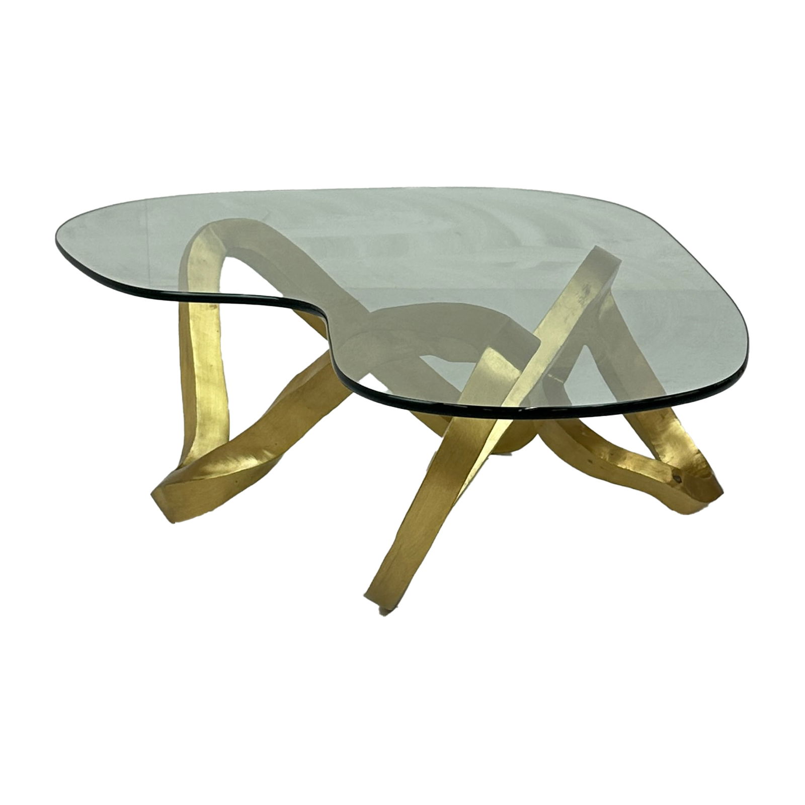 Gold Houston Coffee Table- Brass with Glass Top: Maker: Organic Modernism Title: Gold Houston Coffee Table- Brass with Glass Top Material: Brass Style: Mid-Century Modern, Contemporary Design Description: The Gold Houston Coffee Table is a bold sta