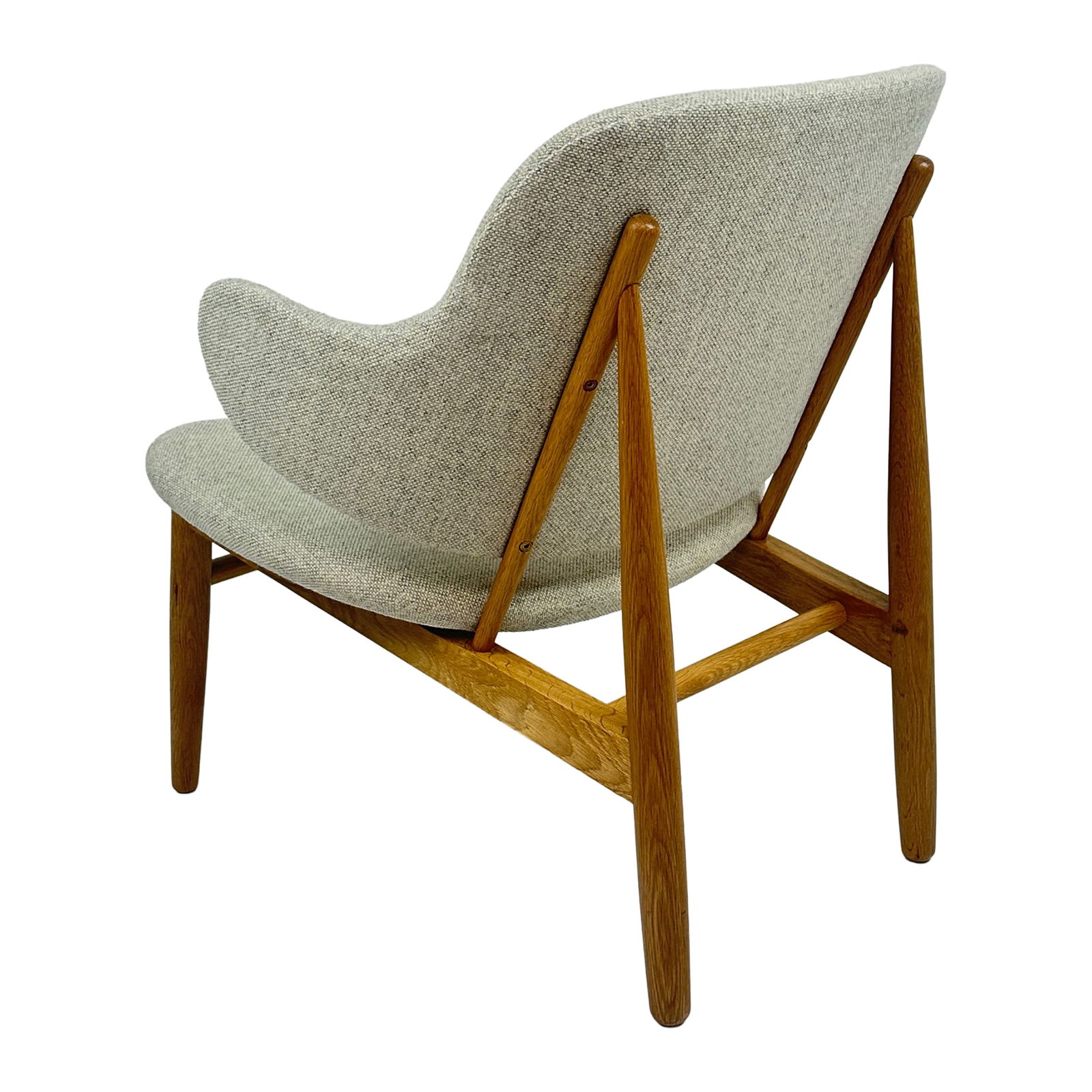 UMMA Lounge Chair: Maker: Organic Modernism Title: UMMA Lounge Chair Style: Mid-Century Modern, Contemporary Design Description: A stylish and sculptural lounge chair featuring a gently curved backrest, integrated arm a