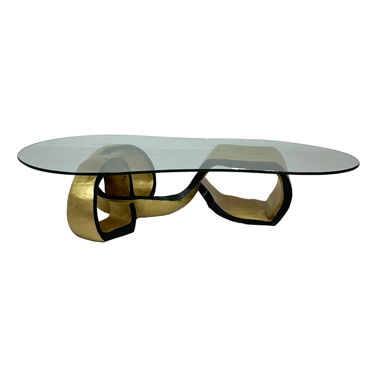 Dallas Brass Coffee Table with Glass Top: Maker: Organic Modernism Title: Dallas Brass Coffee Table with Glass Top Material: Brass Style: Mid-Century Modern, Contemporary Design Description: The Dallas Brass Coffee Table with Glass Top featu