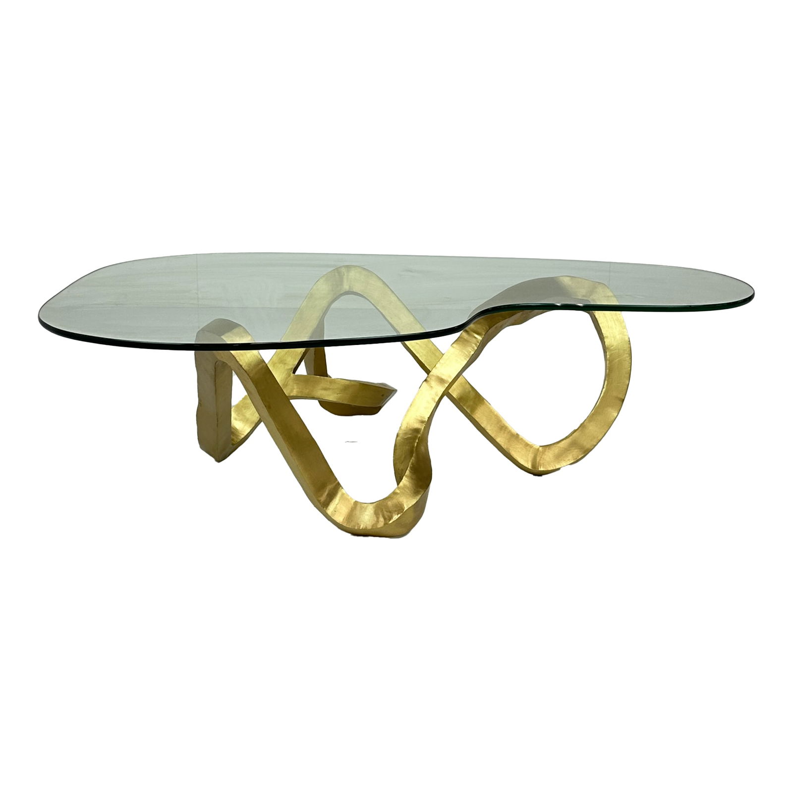 Gold Houston Coffee Table- Brass with Glass Top: Maker: Organic Modernism Title: Gold Houston Coffee Table- Brass with Glass Top Material: Brass Style: Mid-Century Modern, Contemporary Design Description: The Gold Houston Coffee Table is a bold sta