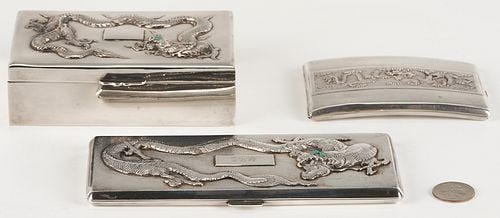 3 Chinese Export Silver Dragon Boxes: Three (3) Chinese silver boxes with raised dragon decoration, including two cigarette cases stamped "silver" and "90," and one trinket box with wood interior, stampe