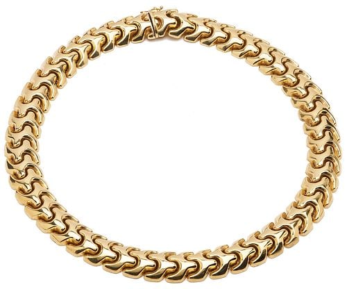 14K Gold Omega Link Necklace: Ladies' 14K yellow gold omega link necklace. The necklace is marked "14K Italy" and XRF tests 14K gold. The necklace is 19 in. L. and has a weight of 81.63 grams. Additional high-re