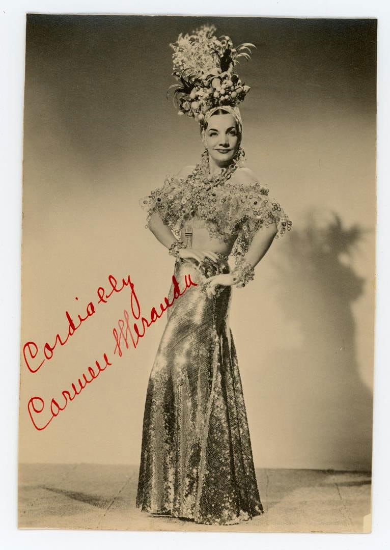 Carmen Miranda Signed Autographed Photo: 4 1/2" by 6 1/2". Signed as shown. Maria do Carmo Miranda da Cunha (9 February 1909 ? 5 August 1955), known professionally as Carmen Miranda was a Portuguese-born Brazilian singer, dancer, and actress