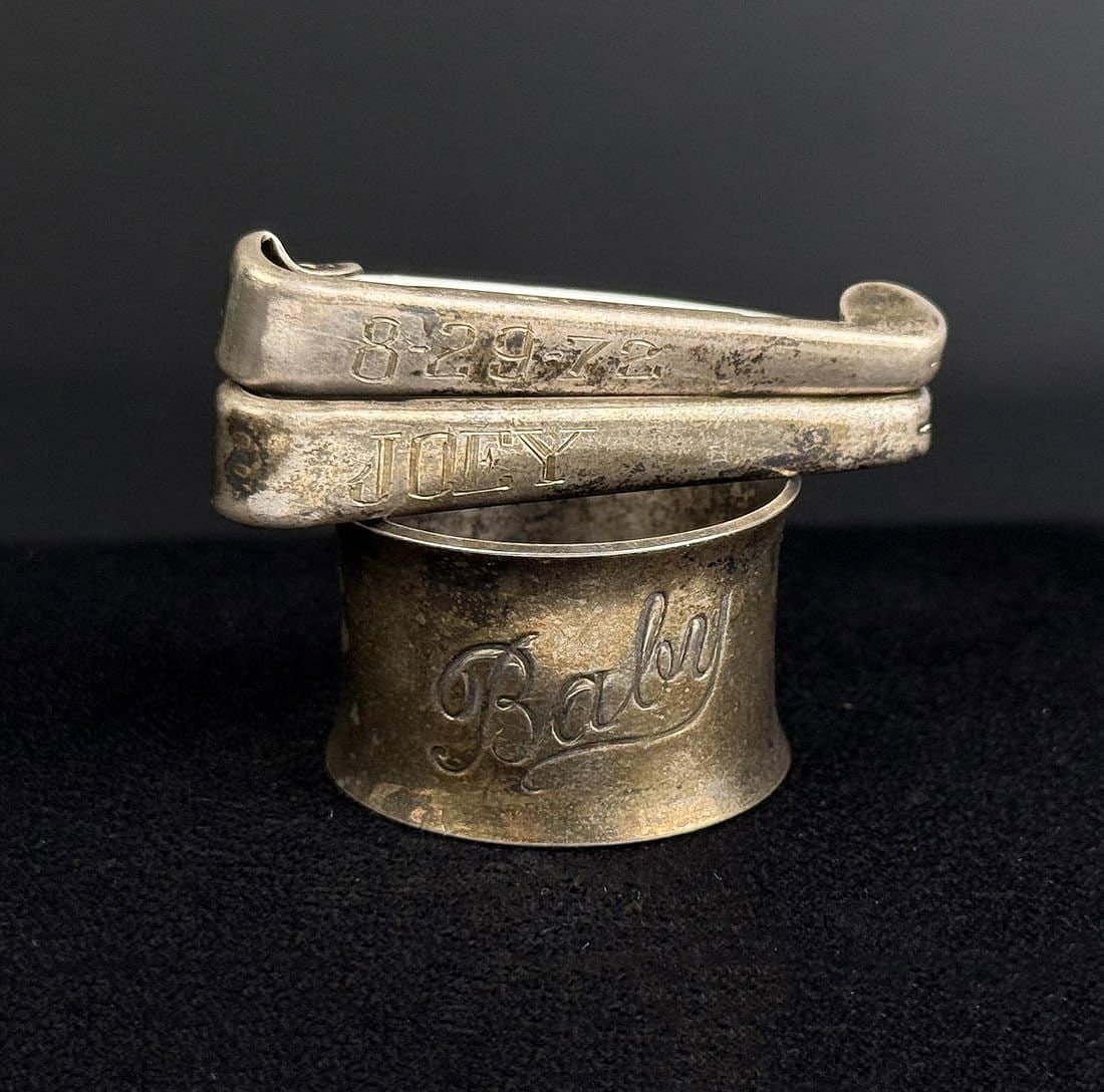 Sterling Silver Diaper Pins and Napkin Ring: Napkin ring is not sterling silver. Pins weigh at 9.98 grams.