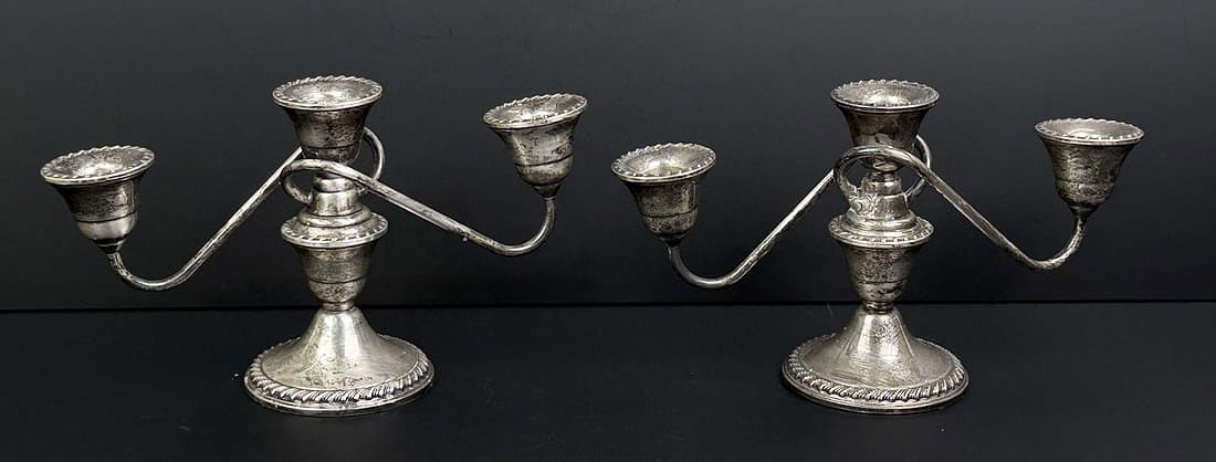 Rogers Weighted Sterling Silver Candlesticks: 9 7/8" by 5 3/4" by 3 1/2" each.
