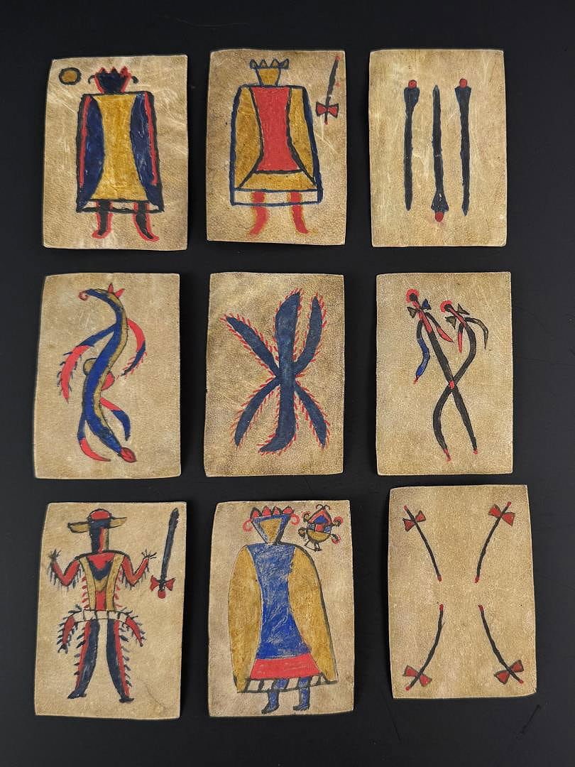 Apache American Indian Parfleche Playing Cards: 2 1/4" by 3 1/2". Mid 20th Century.