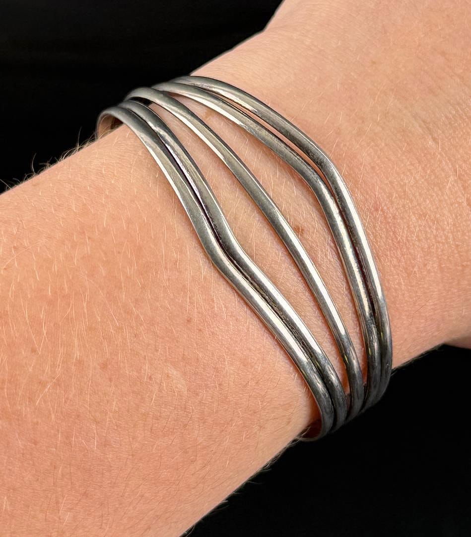 Navajo Sterling Silver Bracelet: 15.26 grams. 6" inner circumference.