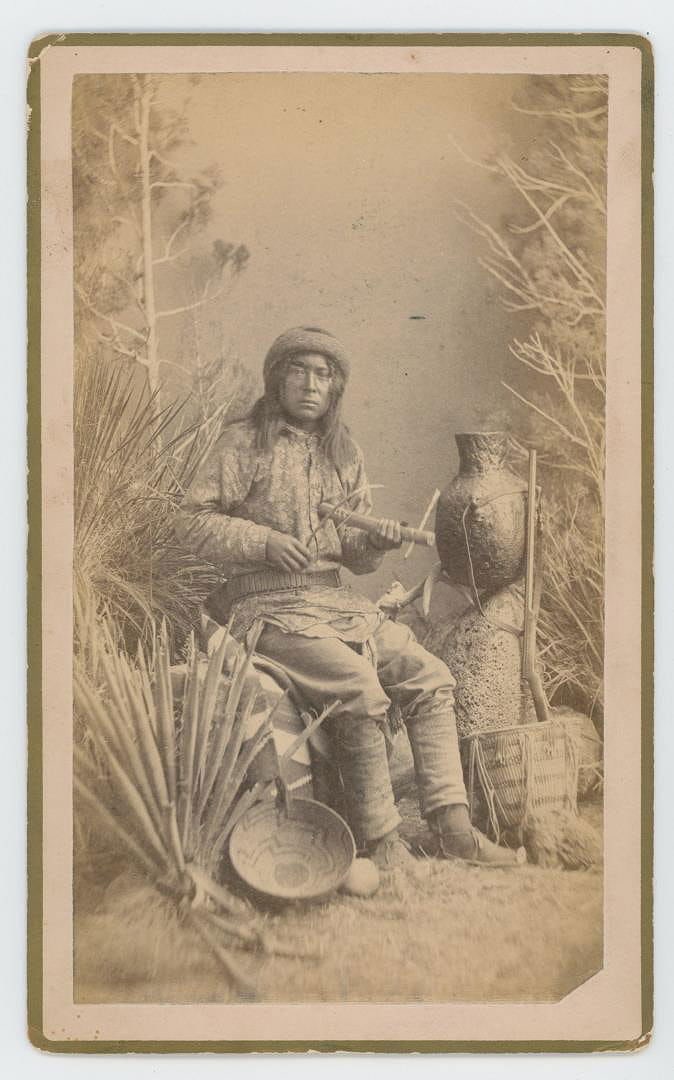 Alfred Frank Randall Apache Indian Photo: Chasi, a Warm Springs Apache musician playing the Apache fiddle. 5 1/4" by 8 1/2".
