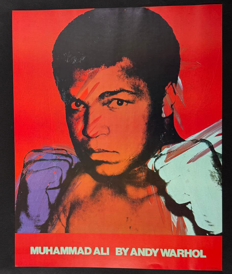 Andy Warhol Muhammad Ali Offset Lithograph: 24" by 30". Copyright symbol at bottom right 1978 Andy Warhol Enterprises. Warhol photographed Ali in 1977 for his Athletes Series. Provenance: From the estate of Rodney Hilton Brown who operated Hilt