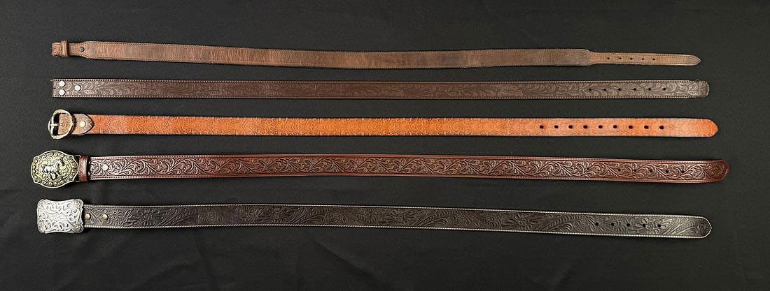 Group of Tooled Leather Cowboy Belts: Nice grouping.