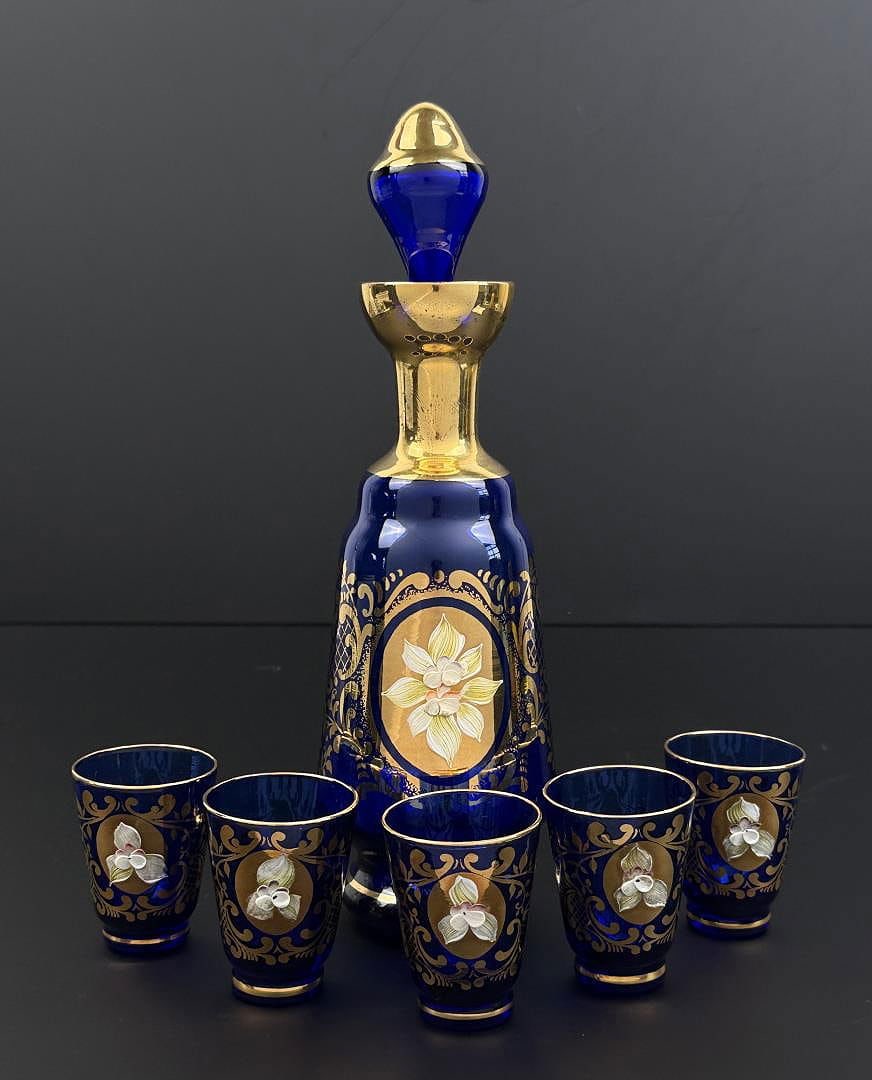 Bohemian Cobalt Glass Decanter Set: Nice gilted set. Decanter is 10 1/2" tall.