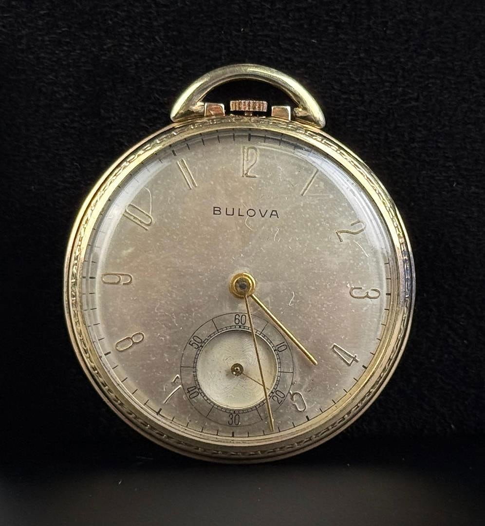 Bulova 10K Rolled Gold Pocket Watch: In working condition. Back is stuck.