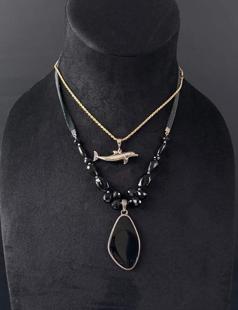 Sterling Silver Dolphin and Onyx Necklaces: Nice grouping. Weighs 35.76 grams.