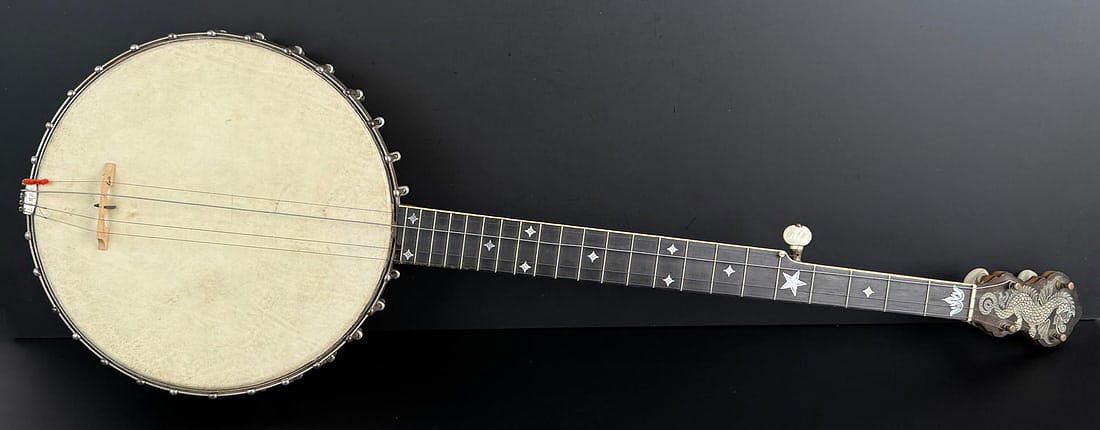 Bacon Professional FF No. 3 Chubby Dragon Banjo: 5 String Banjo, 1907, made in Boston. 36" long. Original as-found condition as pictured. The earliest Bacon Professional banjos were made by Vega for Bacon, and this was the top of the line at that ti