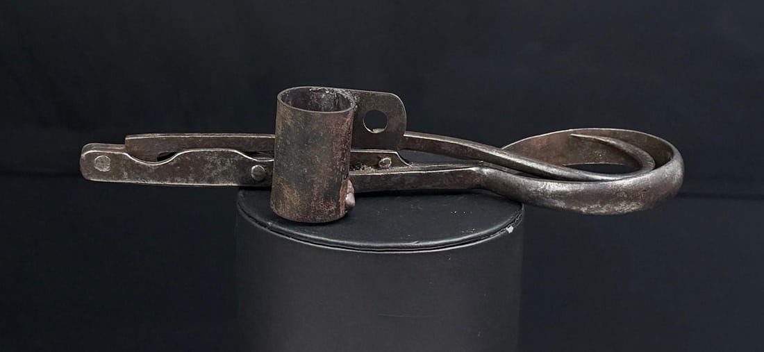 Double Folding Miners Mining Candlestick: One of the Holy Grails of the Candlestick collecting hobby. This variant has a folding hook and a folding tip. 9 1/4" long. Ex-Roger Peterson collection.