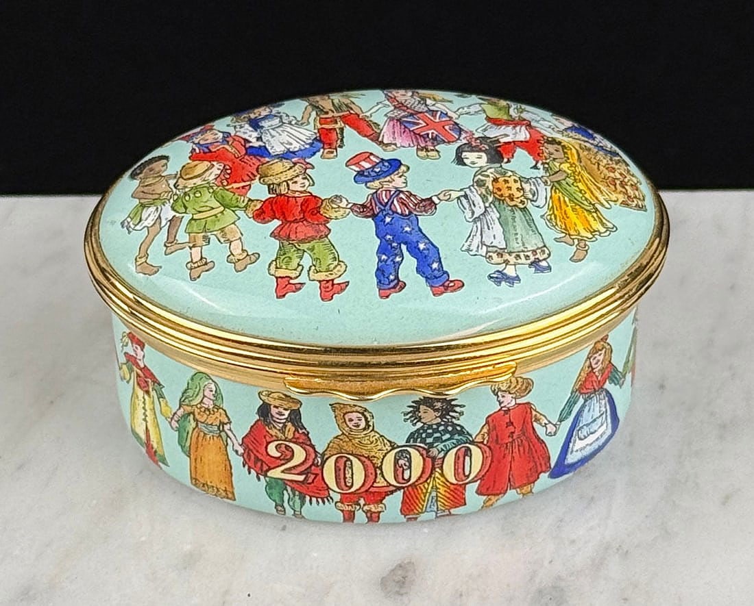 2000 Haclyon Days Enamel Trinket Box: Titled Children of the Millenium, 2000. 1" by 1 3/4"