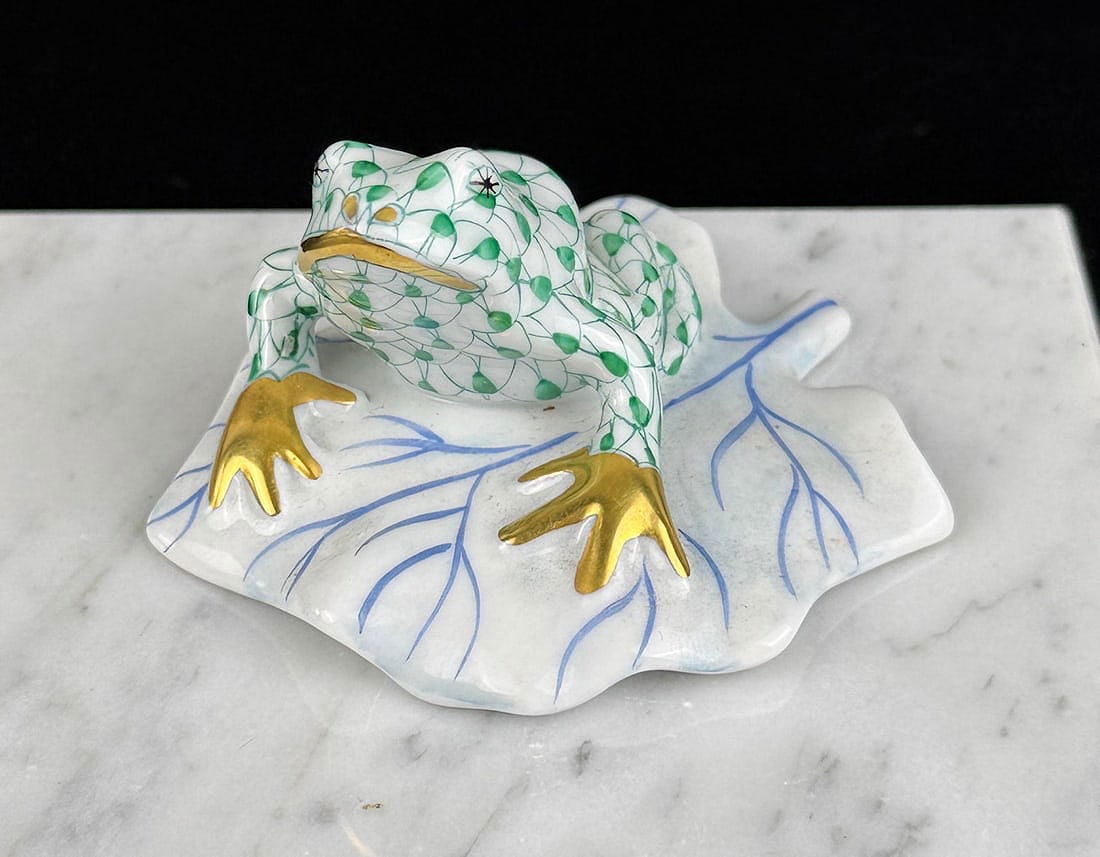 Herend Hungary Porcelain Frog on Lily Pad: Featuring 24k gold accents on its feet, this is from the Meadow Collection. 1 1/2" by 2 1/4" by 2 3/4"