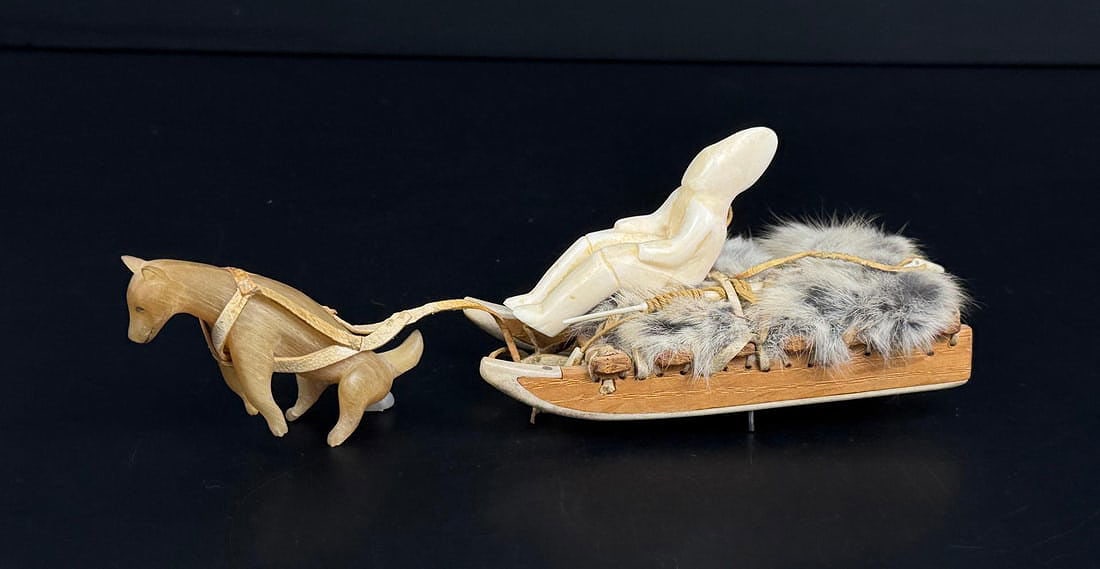 Alaskan Inuit Eskimo Baker Lake Sled Dog Team: 9" by 2 5/8" by 2 1/2". Native made prior to 1972. This item cannot be shipped to Oregon, California, Hawaii, New York, New Jersey, Internationally, or any other state that prohibits.