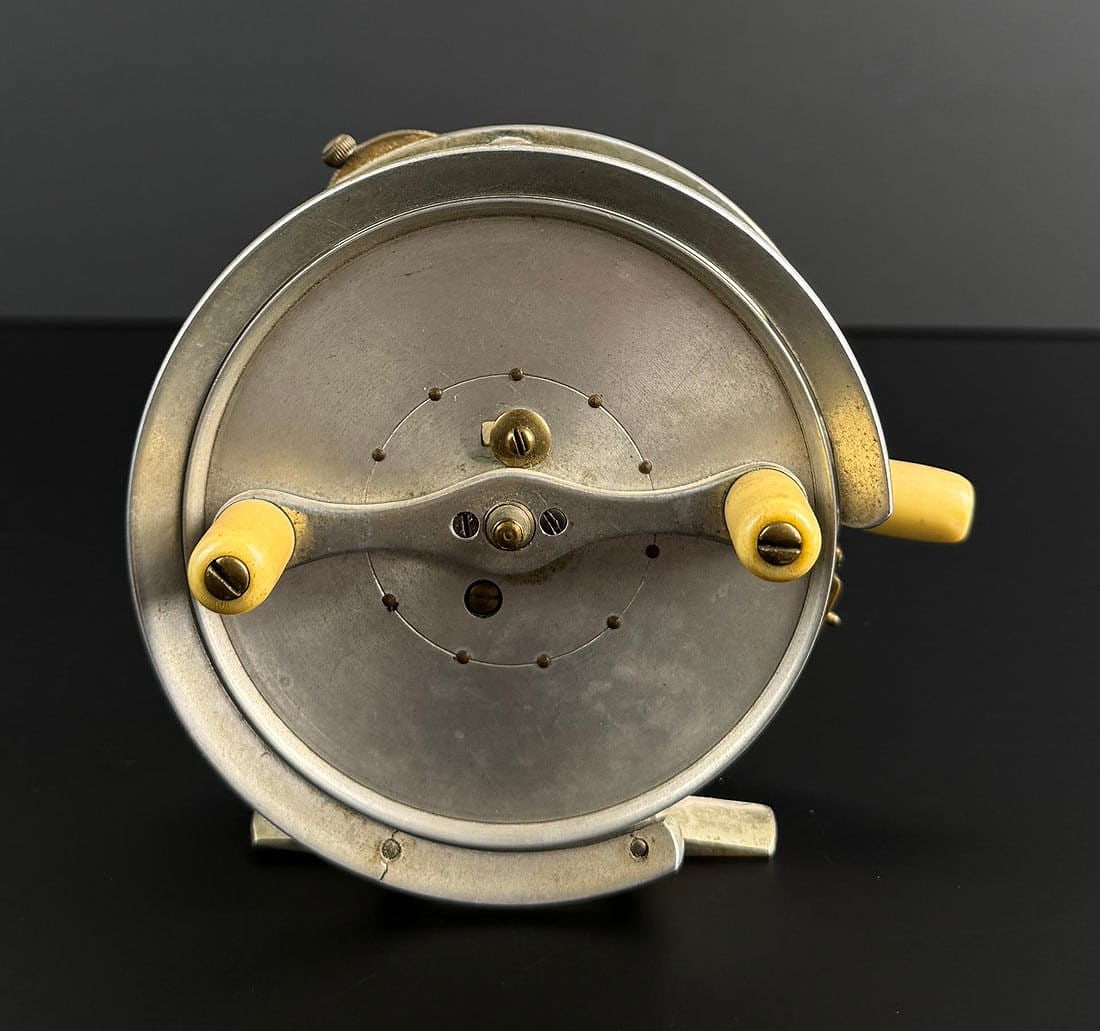Cogswell & Harrison The Nova Fly Fishing Reel: Cogswell & Harrison, Piccadilly London England. Large arbor sea reel. Small crack in reel housing near the mounting seat. Manufactured for Cogswell and Harrison by Hardy Bros reels.