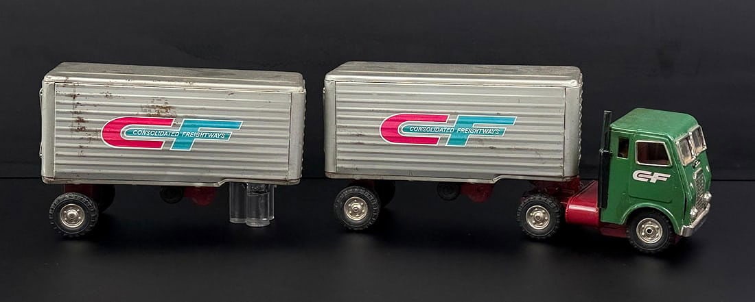 Consolidated Freightways Japan Tin Toy Truck: Truck and Trailers were made in Japan. Missing attachment piece.