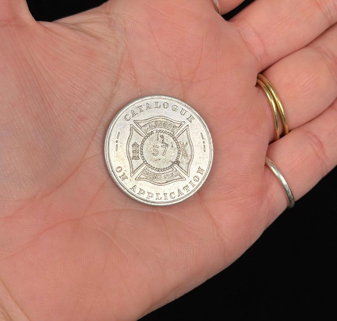 Charles D Reese Warren St NY Fire Department Token: Advertising for Charles Reese fire and police badges.