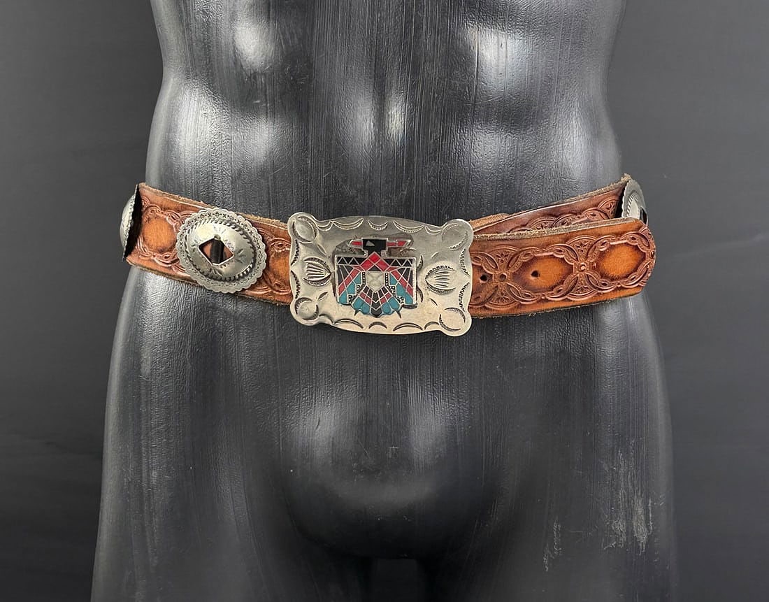 Frontier Buckles Nickle Silver Tooled Cowboy Belt: Native American Style. Belt measures 40" long.