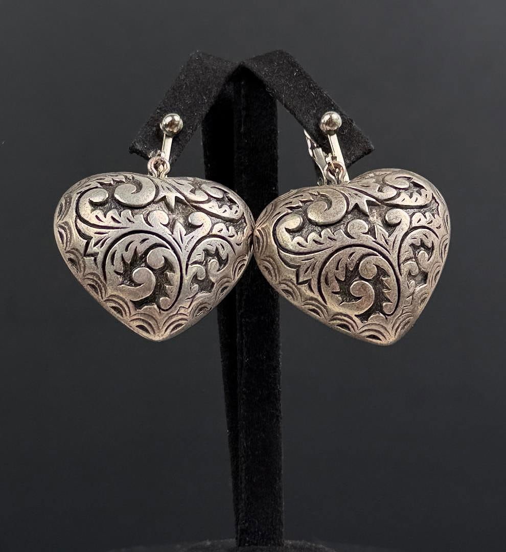 Sterling Silver Heart Earrings: 16.60 grams. Measures 1 2/5" long.