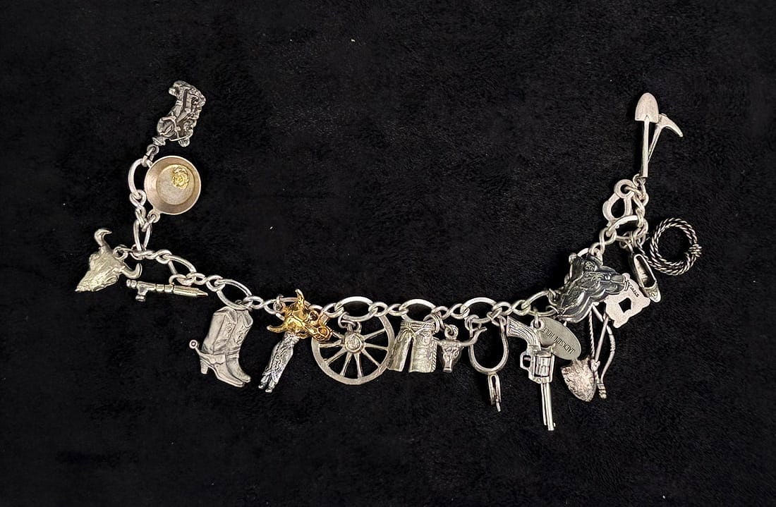 Sterling Silver Charm Bracelet: 41.09 grams