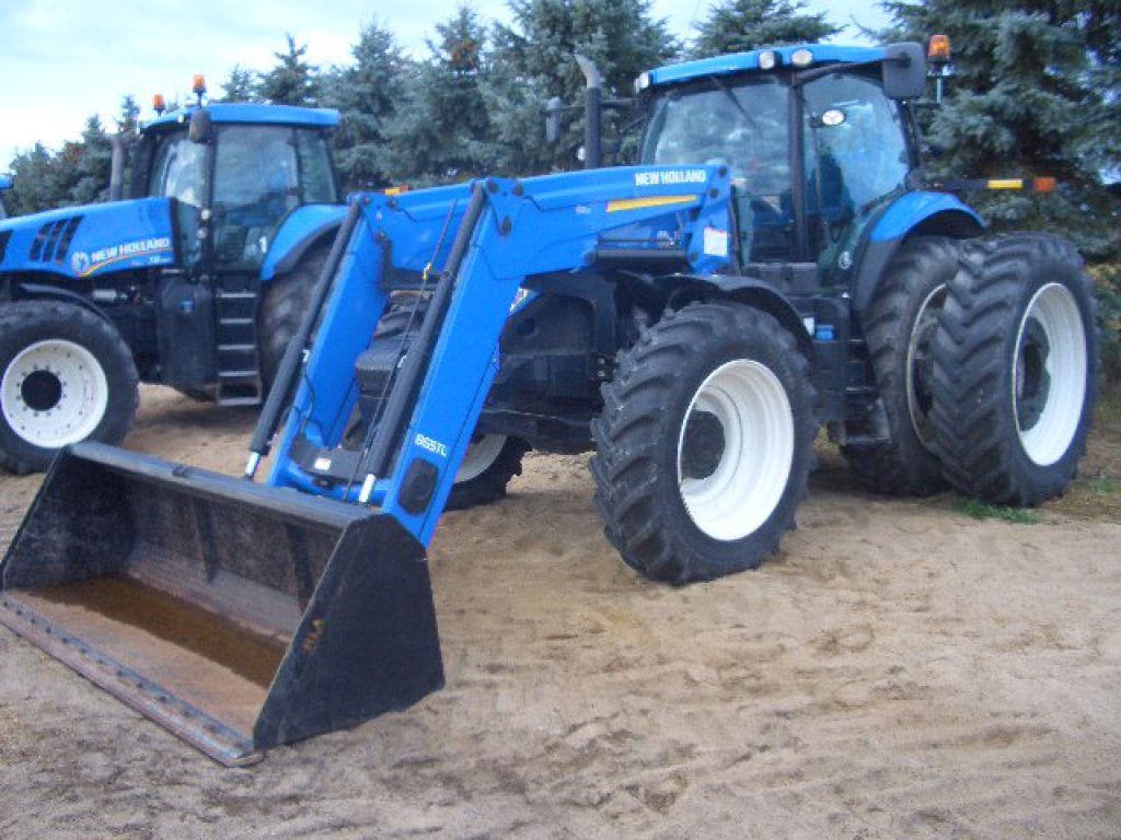 2011 NH T7-260 MFWD Tractor: 2011 NH T7-260 MFWD Tractor CAH Loader package 2240 hrs TRIMBLE FMX 1000 GPS UNIT 480/80R46 duals SN#ZCBZ11686 w/ loader