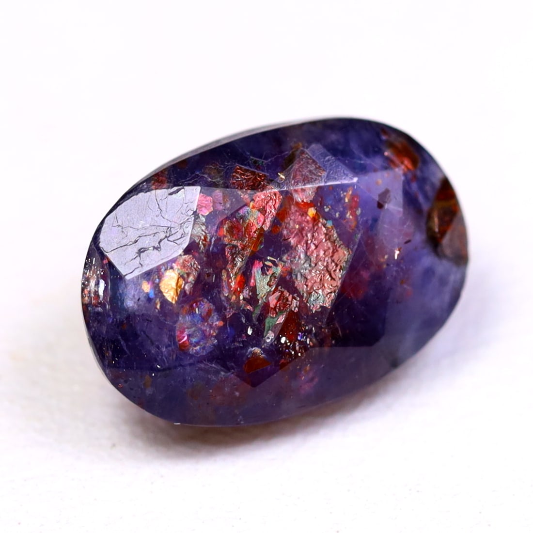 3.01Ct Natural Bloodshot Iolite Sunstone - India Gemstone - Oval Faceted (OT4892): Ksmith Jewels Global Welcome to our auction house, today auction brought to you by Ksmith Jewels Global based in Penang, Malaysia specialize in all kinds of opal and color gemstone both in manufacturi
