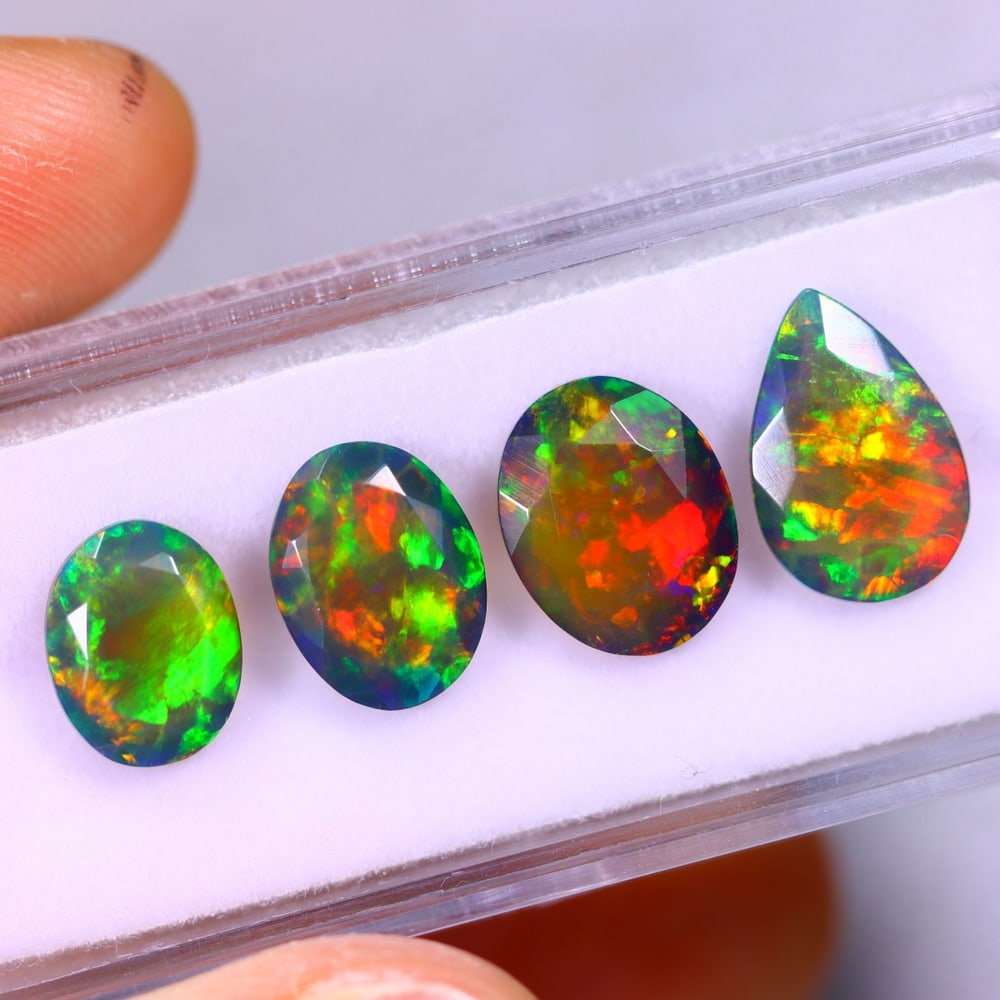 6.69Ct Welo Black Opal Polished - Ethiopian Opal - Faceted Set: Ksmith Jewels Global Welcome to our auction house, today auction brought to you by Ksmith Jewels Global based in Penang, Malaysia specialize in all kinds of opal and color gemstone both in manufacturi