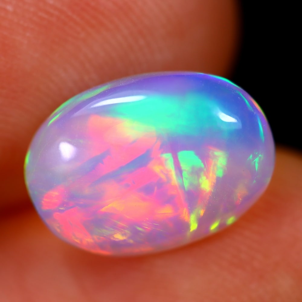 1.77Ct Welo Opal Polished - Ethiopian Opal - Oval Cabochon: Ksmith Jewels Global Welcome to our auction house, today auction brought to you by Ksmith Jewels Global based in Penang, Malaysia specialize in all kinds of opal and color gemstone both in manufacturi