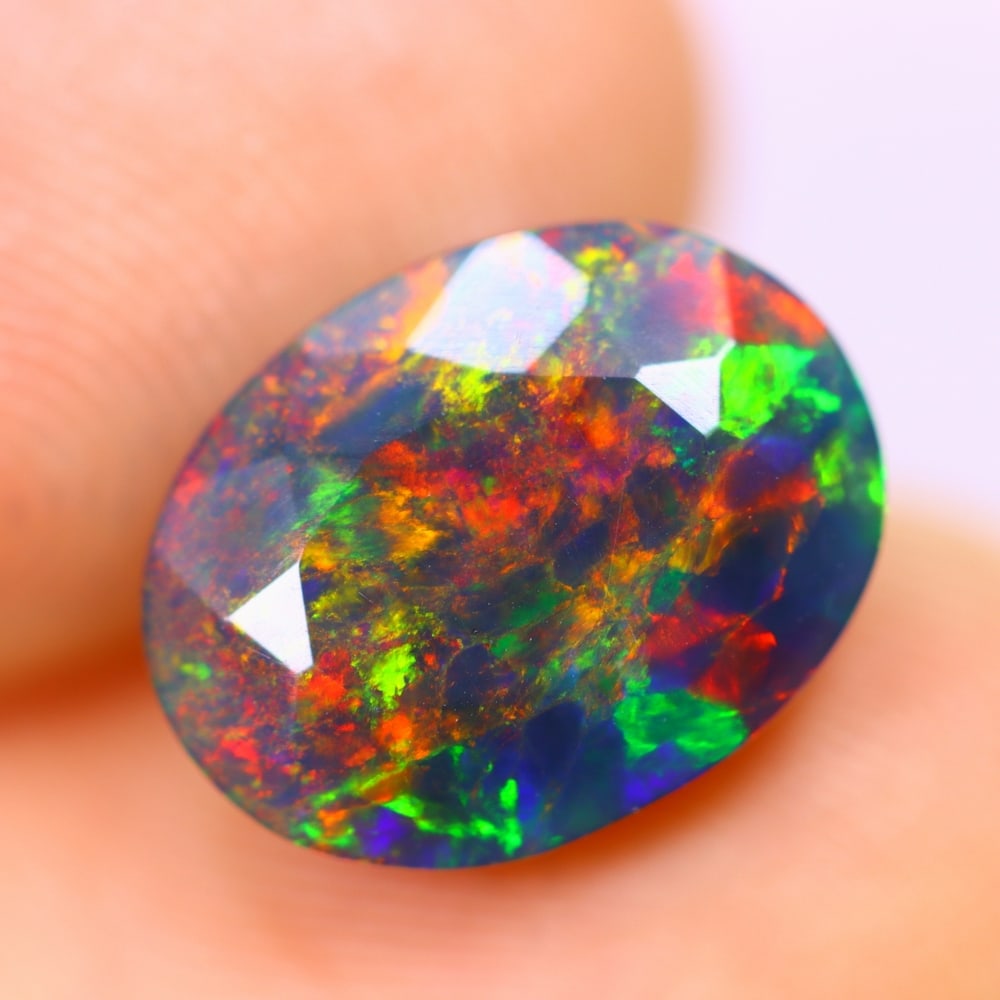 2.32Ct Welo Black Opal Polished - Ethiopian Opal - Oval Faceted (1 of 7)