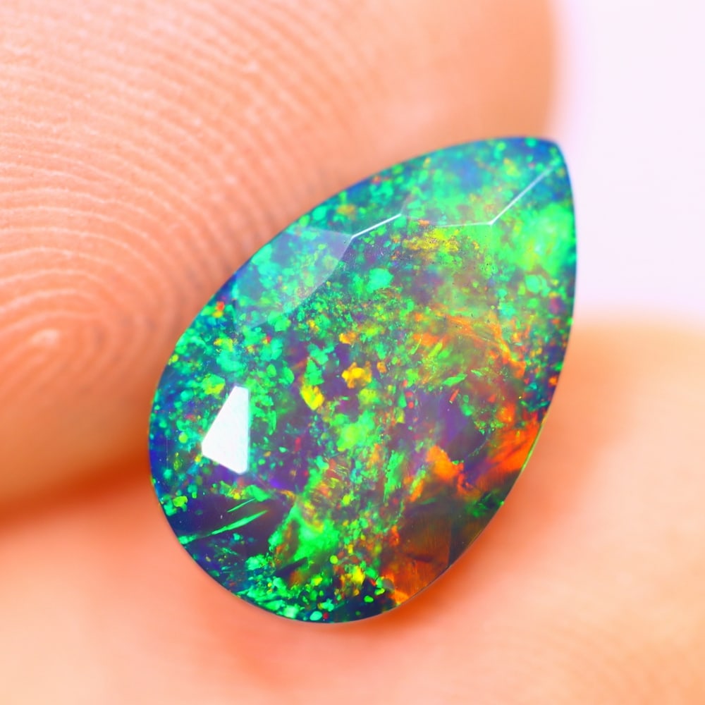 1.80Ct Welo Black Opal Polished - Ethiopian Opal - Pear Faceted: Ksmith Jewels Global Welcome to our auction house, today auction brought to you by Ksmith Jewels Global based in Penang, Malaysia specialize in all kinds of opal and color gemstone both in manufacturi