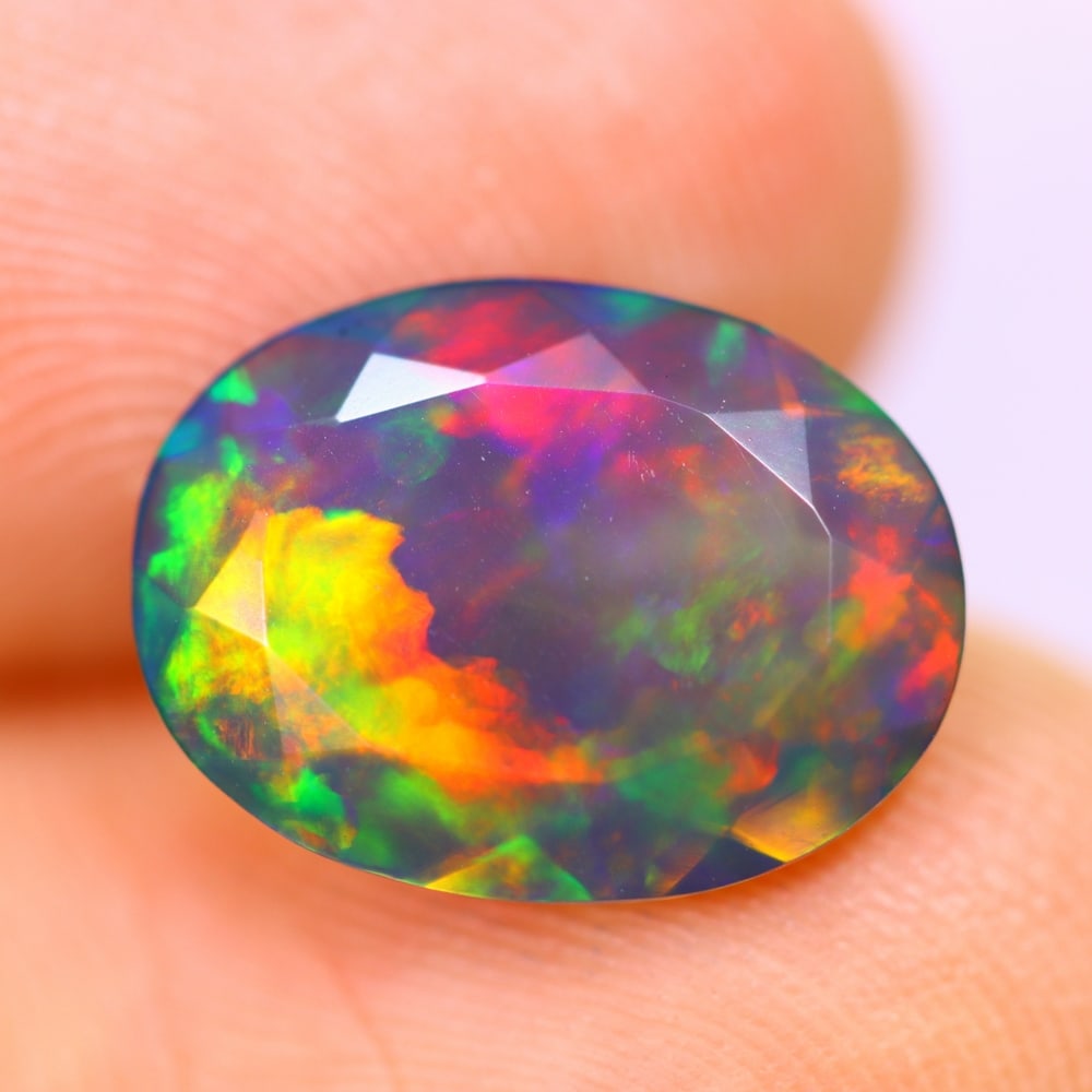 2.44Ct Welo Black Opal Polished - Ethiopian Opal - Oval Faceted (1 of 7)