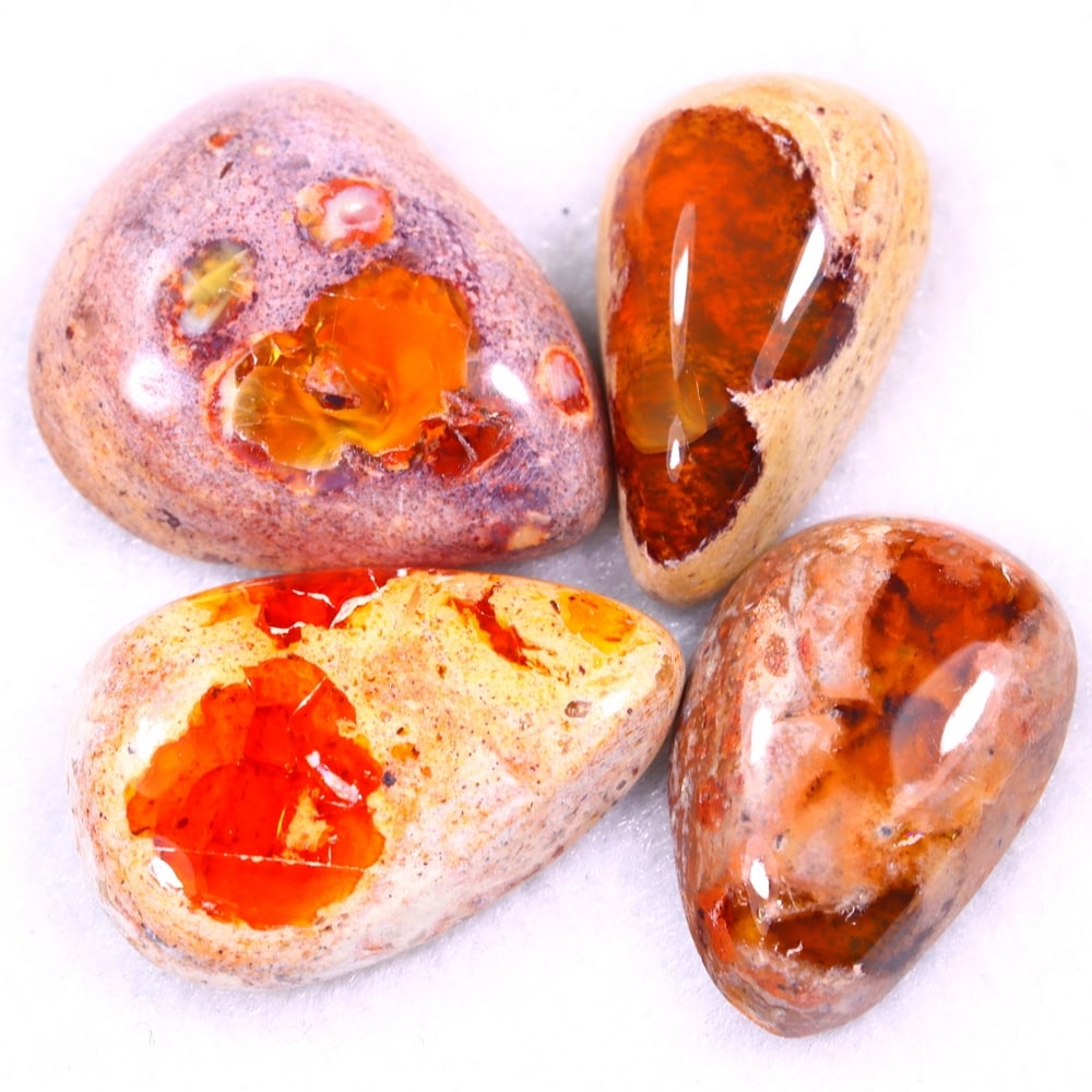 37.50Ct Group of 4 Mexican Fire Opal - Mexican Opal - Cabochon: Ksmith Jewels Global Welcome to our auction house, today auction brought to you by Ksmith Jewels Global based in Penang, Malaysia specialize in all kinds of opal and color gemstone both in manufacturi