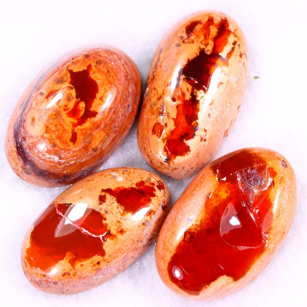 42.85Ct Group of 4 Mexican Fire Opal - Mexican Opal - Cabochon: Ksmith Jewels Global Welcome to our auction house, today auction brought to you by Ksmith Jewels Global based in Penang, Malaysia specialize in all kinds of opal and color gemstone both in manufacturi