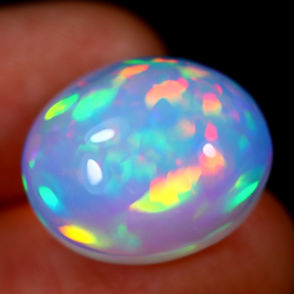 12.54Ct Welo Opal Polished - Ethiopian Opal - Oval Cabochon: Ksmith Jewels Global Welcome to our auction house, today auction brought to you by Ksmith Jewels Global based in Penang, Malaysia specialize in all kinds of opal and color gemstone both in manufacturi