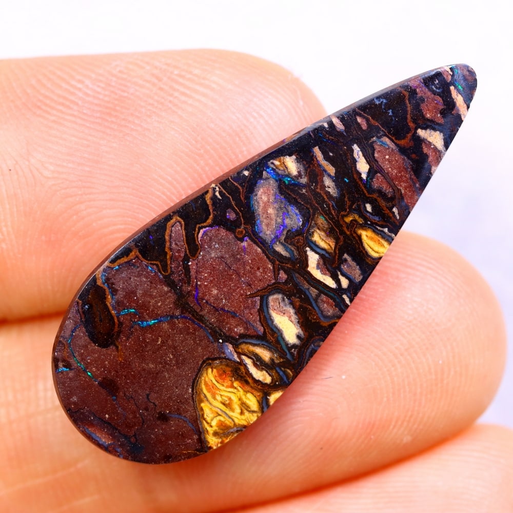 12.28Ct Koroit Boulder Opal Polished - Australian Opal - Pear Cabochon: Ksmith Jewels Global Welcome to our auction house, today auction brought to you by Ksmith Jewels Global based in Penang, Malaysia specialize in all kinds of opal and color gemstone both in manufacturi