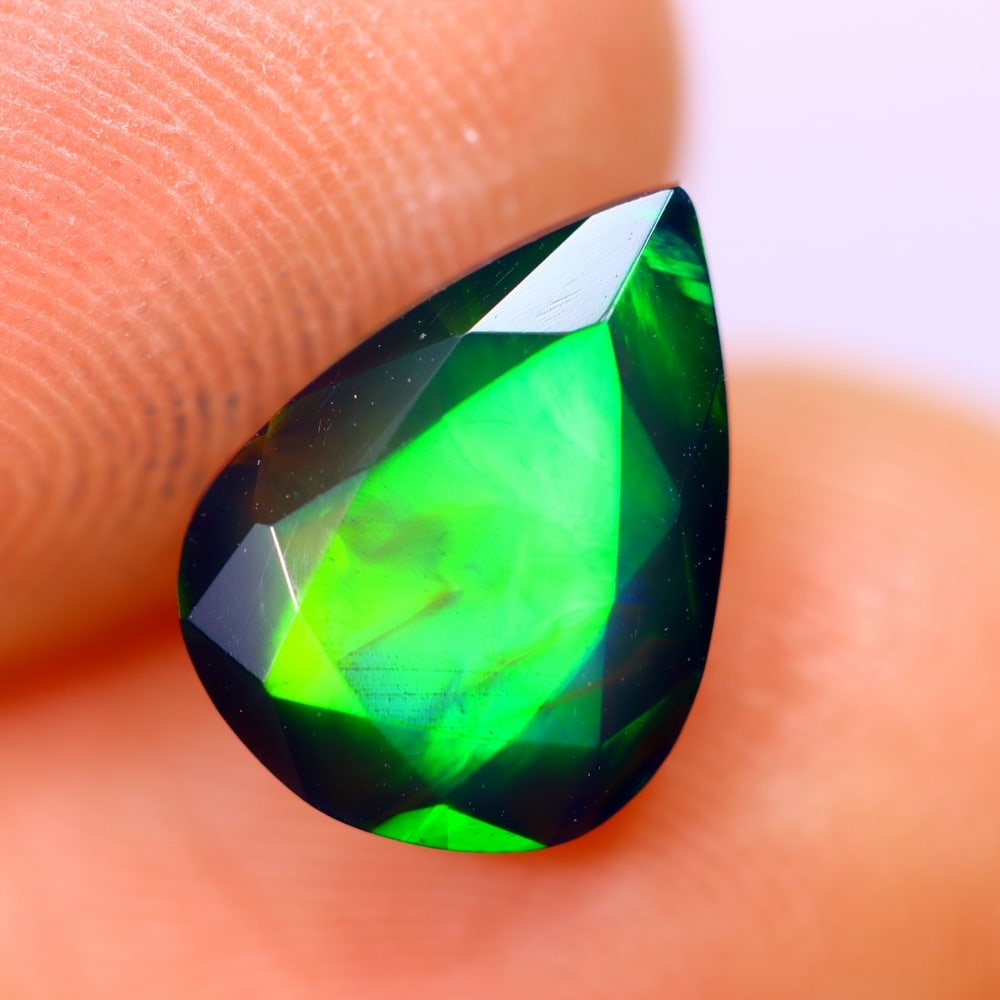1.40Ct Welo Black Opal Polished - Ethiopian Opal - Pear Faceted: Ksmith Jewels Global Welcome to our auction house, today auction brought to you by Ksmith Jewels Global based in Penang, Malaysia specialize in all kinds of opal and color gemstone both in manufacturi