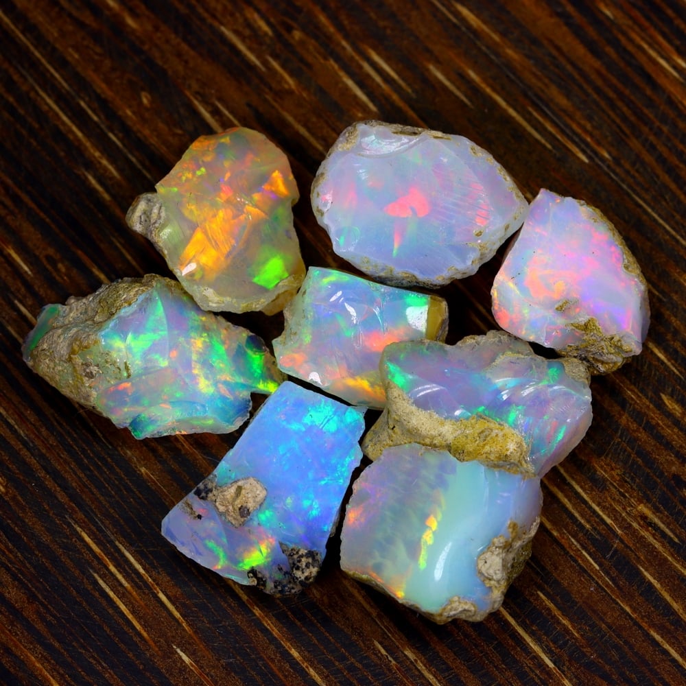 43Ct Group of 8 Rough Opal Specimen - Ethiopian Opal - Mineral Rough Set: Ksmith Jewels Global Welcome to our auction house, today auction brought to you by Ksmith Jewels Global based in Penang, Malaysia specialize in all kinds of opal and color gemstone both in manufacturi