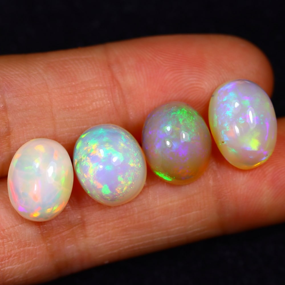 16.71Ct Group of 4 Welo Opal Polished - Ethiopian Opal: Ksmith Jewels Global Welcome to our auction house, today auction brought to you by Ksmith Jewels Global based in Penang, Malaysia specialize in all kinds of opal and color gemstone both in manufacturi